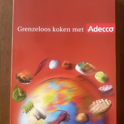 Voorkant van de kookboek-paperback Grenzeloos koken met Adecco van uitgeverij BZZTôH