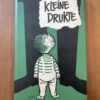 Voorkant van het stofomslag van de hardcover dichtbundel Kleine drukte door Joost de Klerk uit 1953